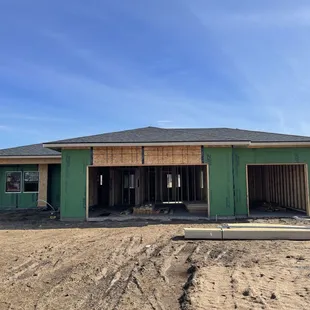 a house under construction in the desert