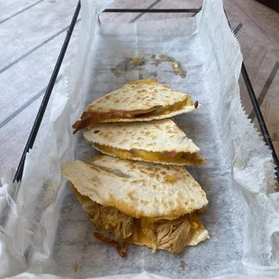 Chicken quesadillas- one was stolen by the man. Comes with 4!