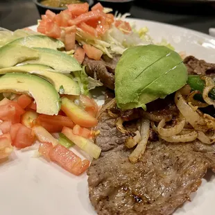 carne asada with lettuce and tomatoes subbed for rice and beans