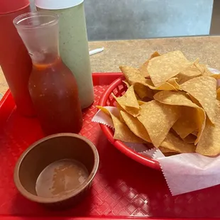 Triple Chips &amp; Salsa set up.  The one in the red bottle is hot and I love it!!!