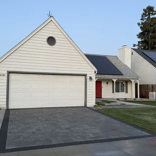 Belgard Paver - the official name is Riviera from the Catalina Grana collection. Demoed, prepped, installed leaving a Picture Perfect Lawn