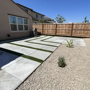 Premium Synthetic lawn, custom concrete designs, and stunning agave plants