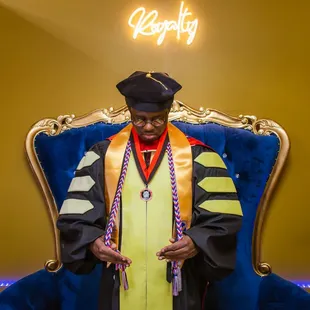 Recent graduate celebrating with photos