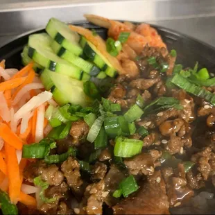 a stir fry with meat and vegetables