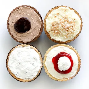 Death By Chocolate, Coconut Cream, Millionaire, and Cheesecake Mousse w/Strawberry Sundae Glaze and Whipped Cream