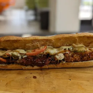 a sandwich on a cutting board