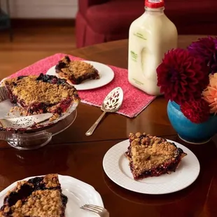 blueberry crumble pie on a table