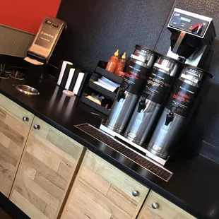 a variety of pizza toppings on a counter