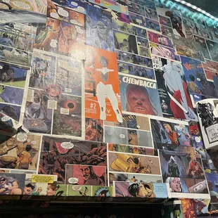 a wall covered in comics