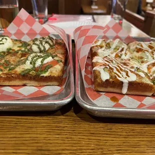 two trays of pizza