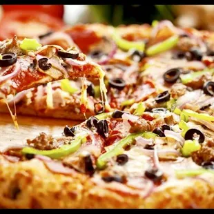 a slice taken out of a pizza