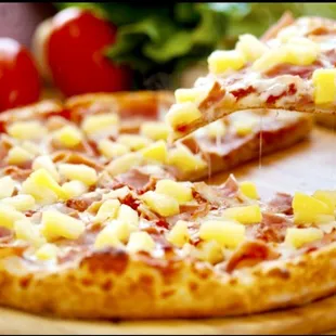 a slice taken out of a pizza