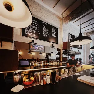 a restaurant with a bar and menus