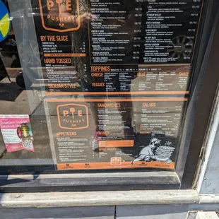 a menu in a store window