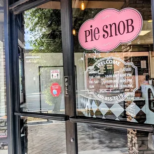 a pie snob sign in the window