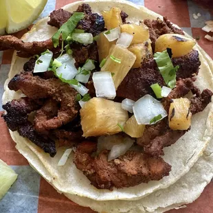 Al Pastor Taco. The pineapple really adds a flavor punch. A must try.