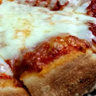 a close up of a pizza