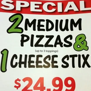 special 2 medium pizzas and 1 cheese stix plus tax