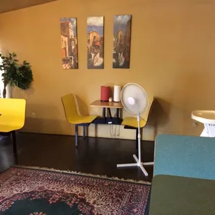 Sitting close to the fan is the only way to stay cool. So hot inside!