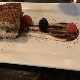 Tiramisu topped with cocoa...minus one bite haha.