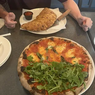 Margherita Pizza (added arugula)  Personal Calzoni