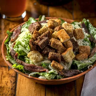 a salad with croutons