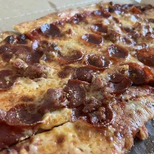 Atomic sausage and pepperoni with extra cheese