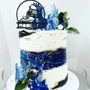 a blue and white wedding cake
