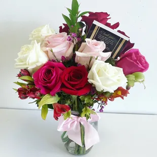 a bouquet of roses in a vase
