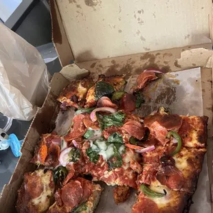 Pepperoni, sausage, onions, green peppers and spinach.