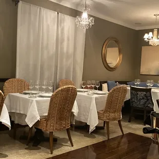 a dining room with tables and chairs