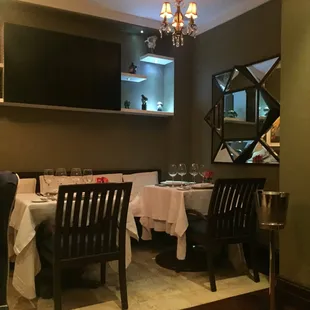 a dining room with tables and chairs