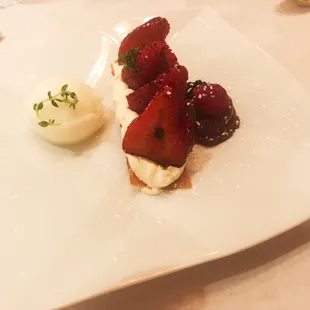 a dessert with strawberries and cream