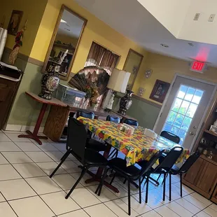 a table and chairs in a kitchen