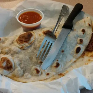 Breakfast taco with beans and chorizo.