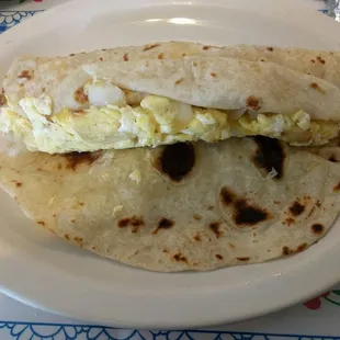 The breakfast tacos are huge! The amazing flour tortilla will help you power through the whole taco - absolutely delicious!