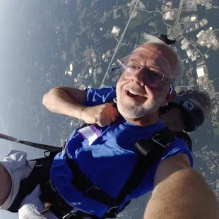 When you first fall you turn and face toward the plane that you just exited.  I smiled the whole way down.