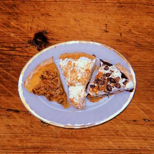 three slices of pie on a plate