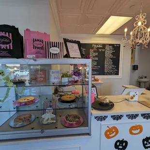 a display case with a variety of baked goods