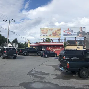Parking lot and front side of the building