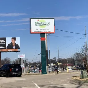 a billboard in a parking lot