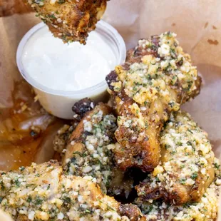 Roasted Buffalo Chicken Wings with house made garlic parmesan sauce