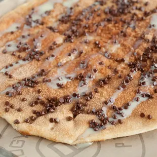 Satisfy your sweet tooth with our deliciously decadent Churro Pizza!