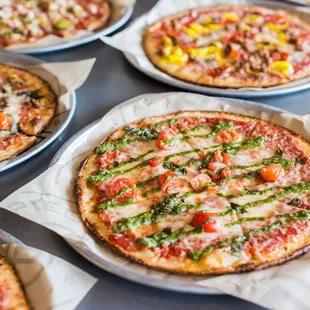 a variety of pizzas