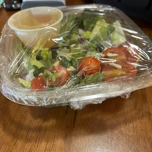 Saran Wrap over my salad. Not a plastic cover.