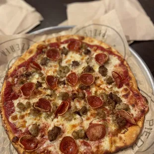 a pepperoni and sausage pizza