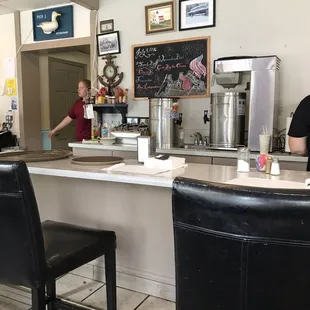 Front counter; chalkboard with Independence themed items.
