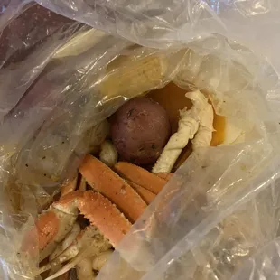 Pier 11's Build Your Own with 1/2 lb. Snow Crab Legs, 1/2 lb. Shrimp (No Shell), and Lobster Tail.