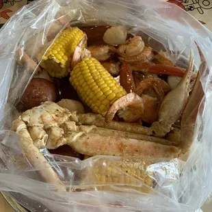 Scallops 1/2 lb. Special, Crab Legs 1/2 lb. Special, 1/2 Shrimp Headless 1/2 lb. Special