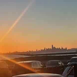 the sun setting over the city